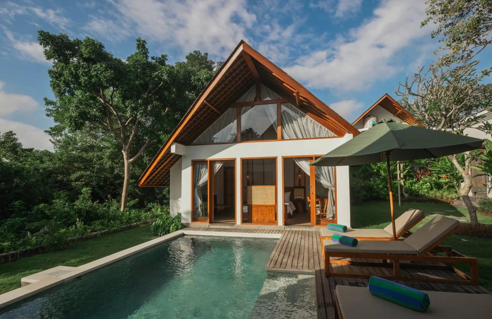 Pool and timber-roofed pavilion
