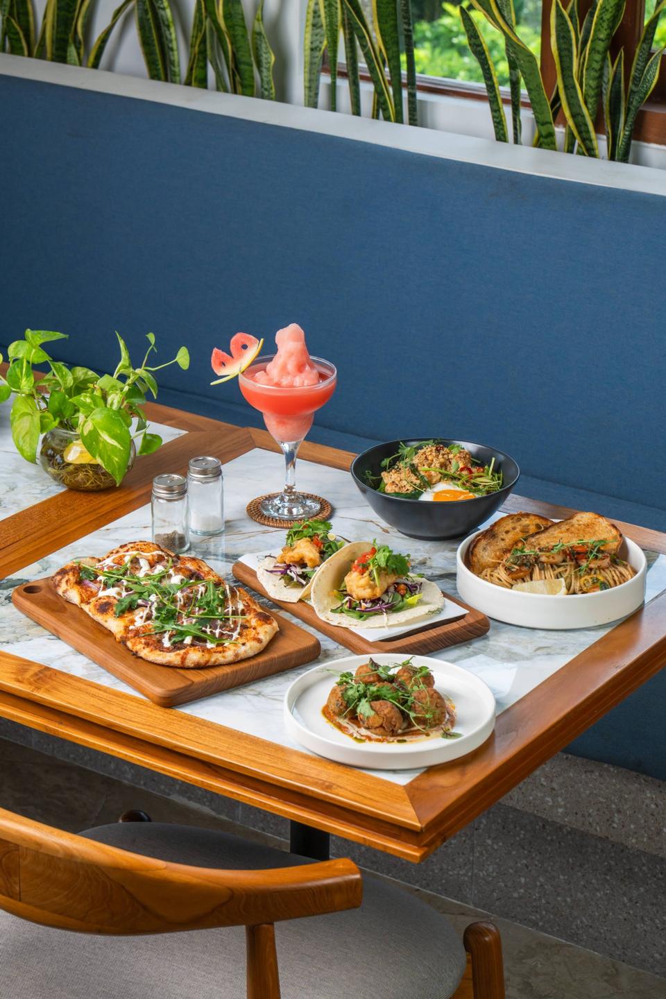 Plates and drinks on a blue table