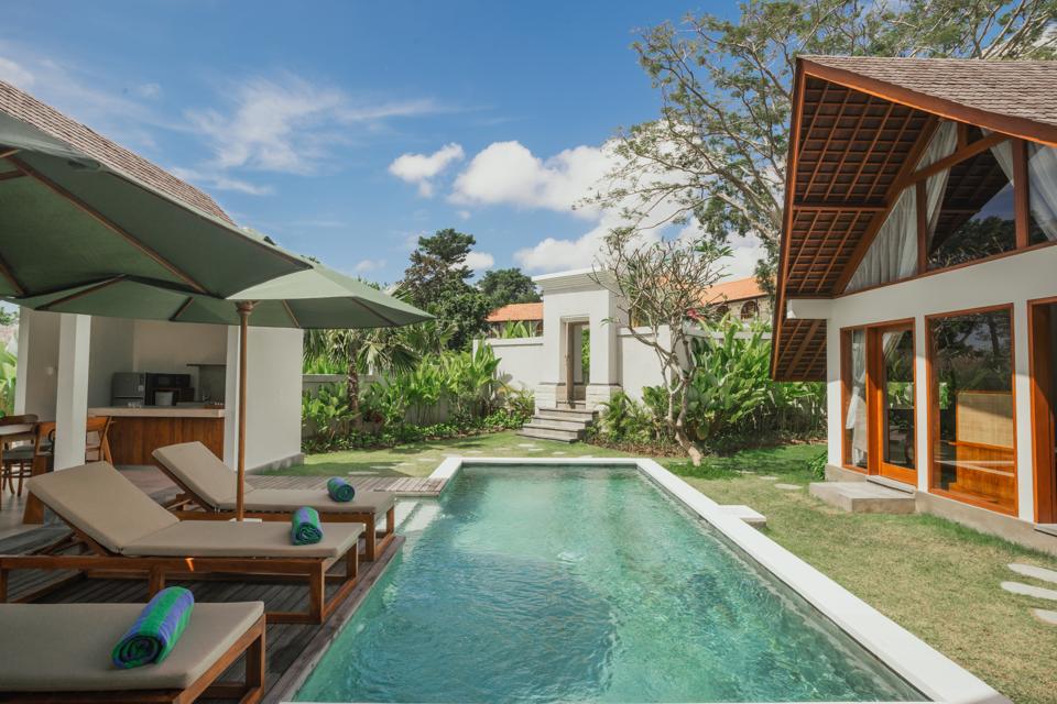 Garden View villa, its pool and sun loungers